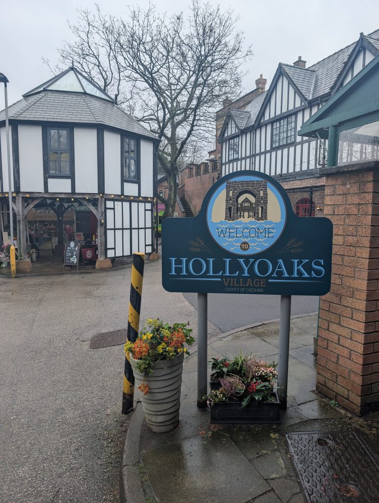A sign saying Hollyoaks in front of the set